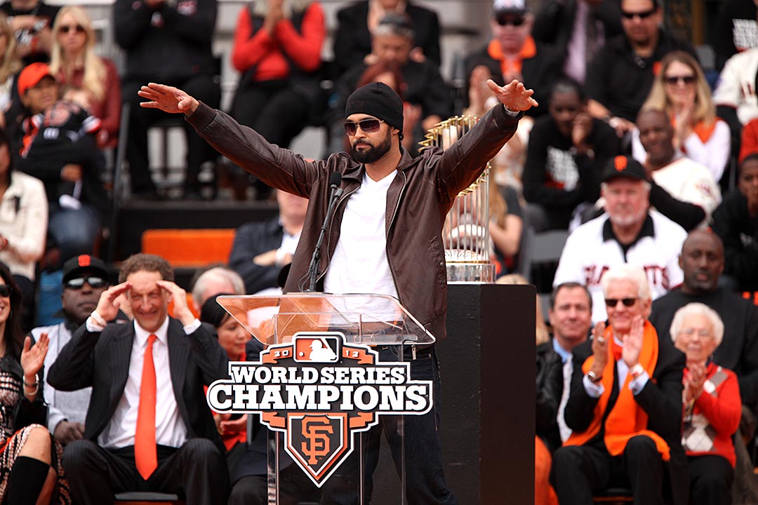 The Giants' Angel Pagan speaks to the crowd as the San Francisco Giants celebrate their World Series win with a parade and celebration in San Francisco, Calif