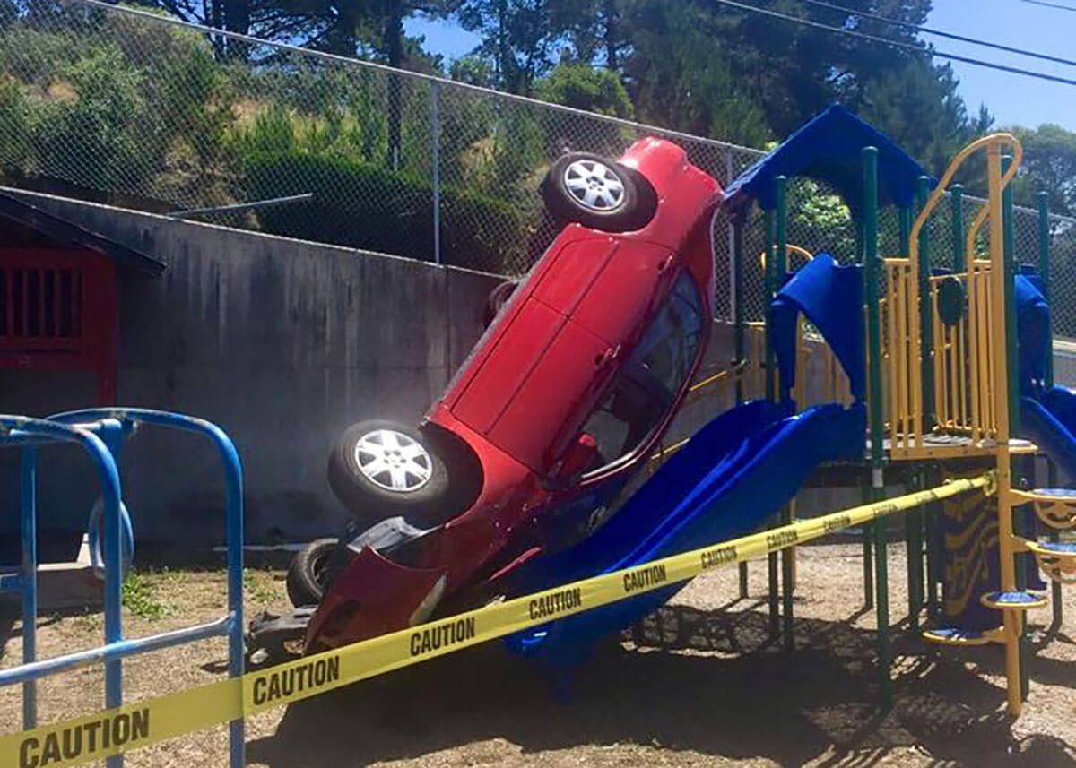Car crashes into playground